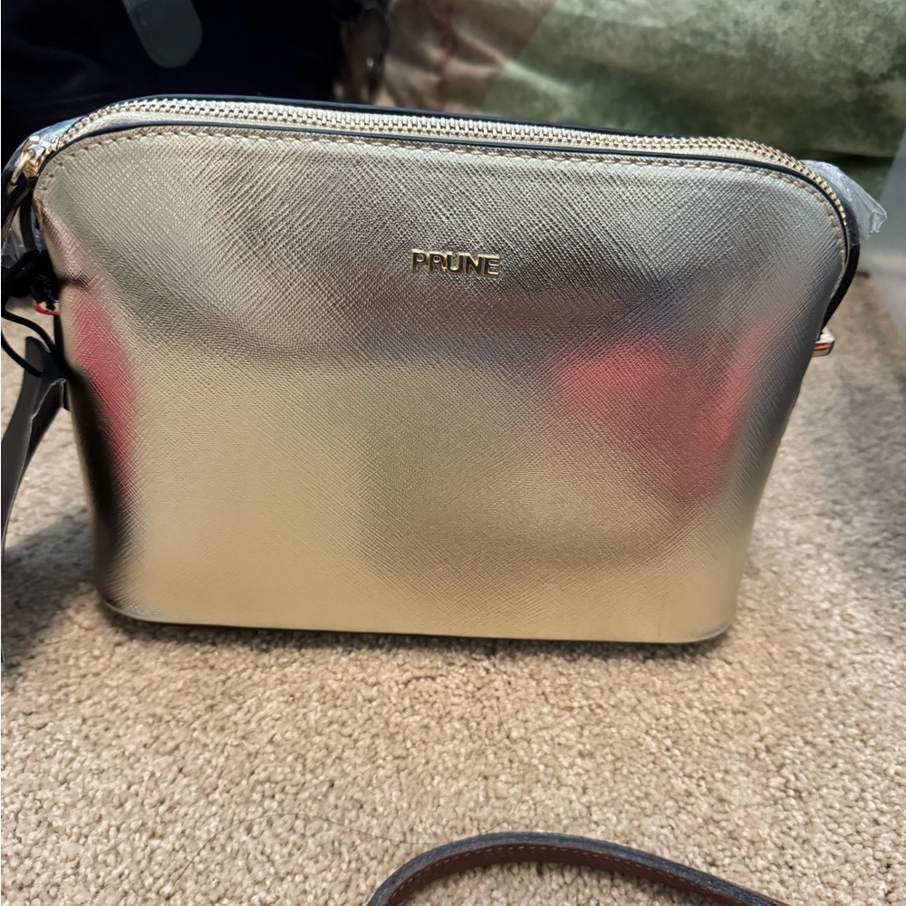 Prune Gold Cosmetic Bag Sleek Design